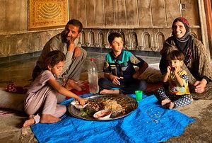 Share your family Christmas dinner with a Christian refugee family