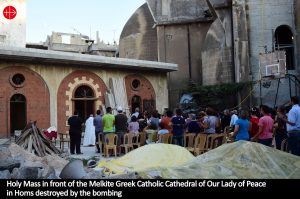holy-mass-in-front-of-the-melkite-greek-catholic-cathedral-of-our-lady-of-peace-in-homs-destroyed-by-the-bombing