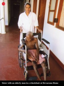 sister-with-an-elderly-man-in-a-wheelchair-at-dev-sarana-homev2